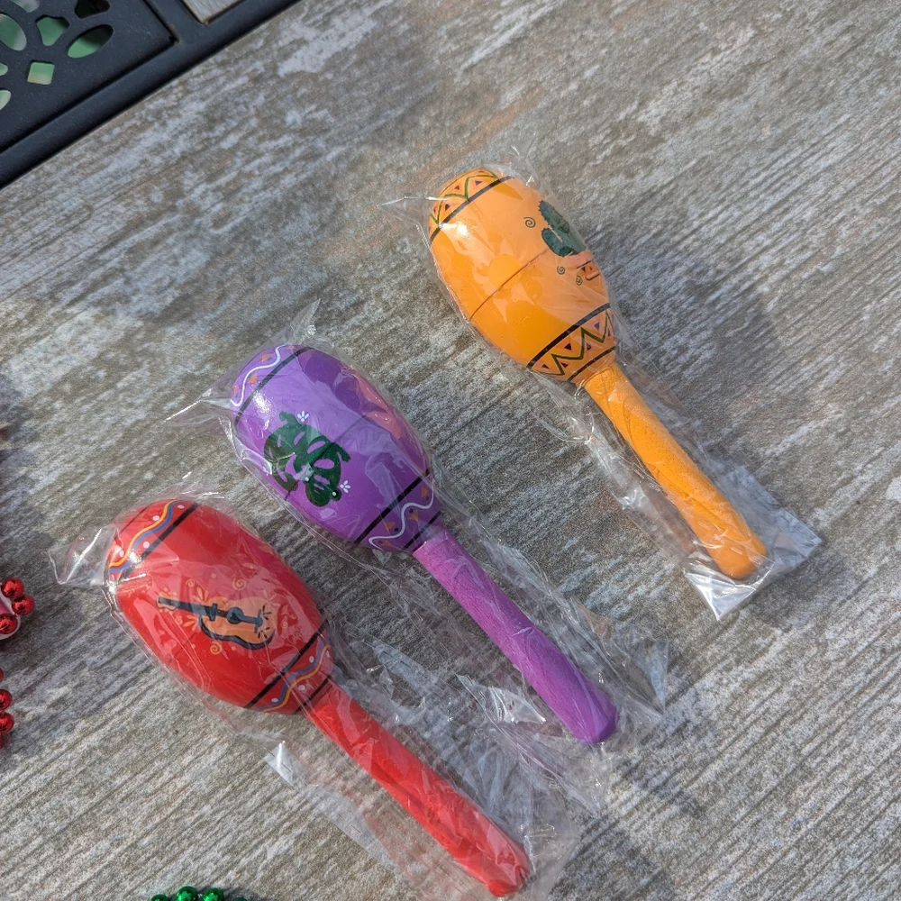 Maraca's Set Of 3. Wooden. Mini. One Red, One Orange & One Purple. Ind. Packaged